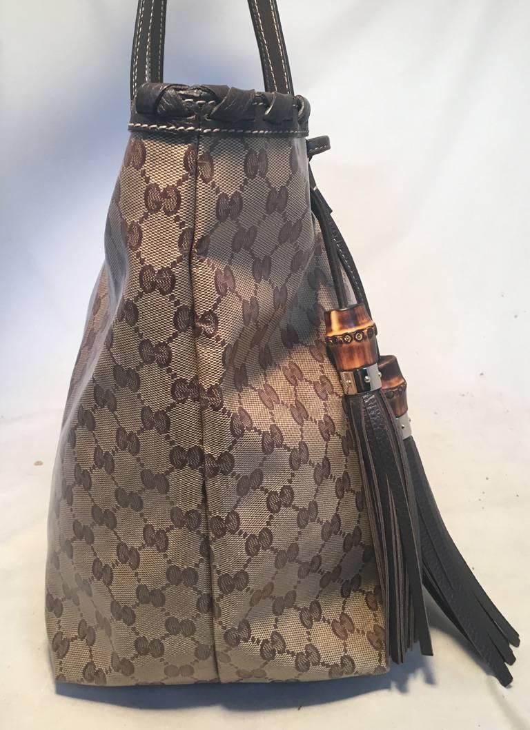 Gucci Coated Monogram Canvas and Braided Leather Trim Tassel Shoulder Bag Tote  In Excellent Condition In Philadelphia, PA