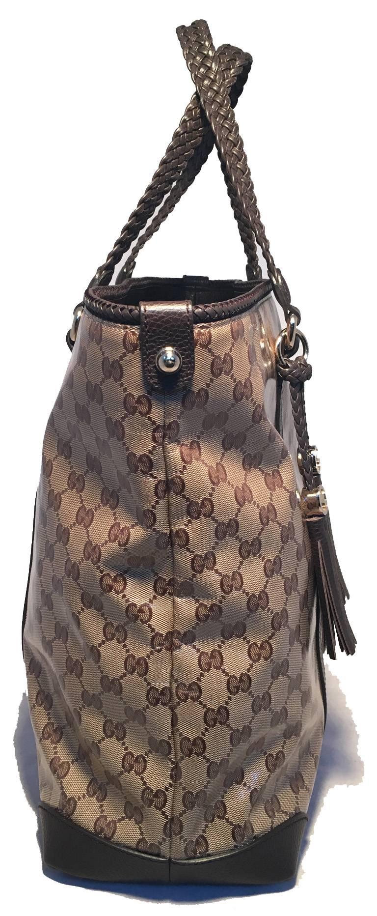 Gucci Coated Monogram and Brown Braided Leather Trim Tassel Tote In Excellent Condition In Philadelphia, PA