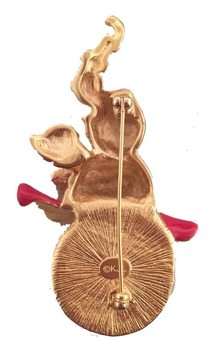 RARE VINTAGE Kenneth Jay Lane Elephant brooch pin in excellent condition.  Gold elephant shape with red enamel skirt, crystal eyes and details, and pearl base.  Gold backing.  Measurements: 3.25