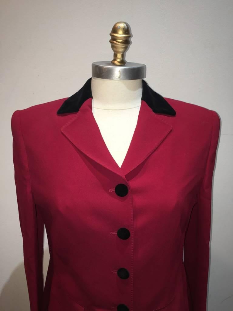 GORGEOUS Vintage Moschino black and red blazer in excellent condition.  Red body with black velvet collar and buttons.  Long sleeve style with 2 flap pockets upon hips.  4 button front closure. Red silk lining. Original tags intact.  Made in Italy. 