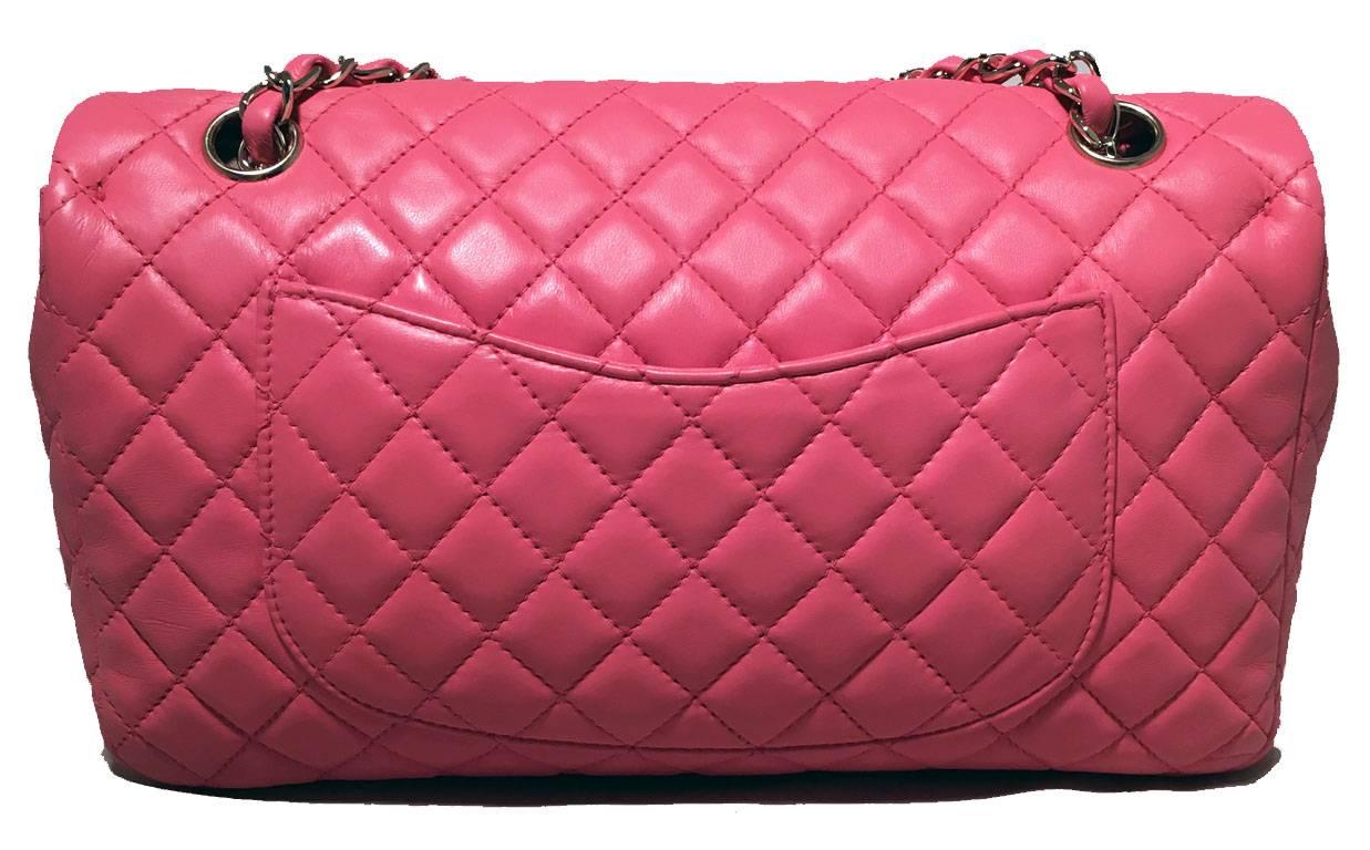 GOREGOUS Chanel pink charms classic flap shoulder bag in excellent condition.  Quilted pink lambskin leather exterior trimmed with silver hardware.  6 unique heart shaped charms along shoulder strap.  CC logo twist closure opens via single flap to