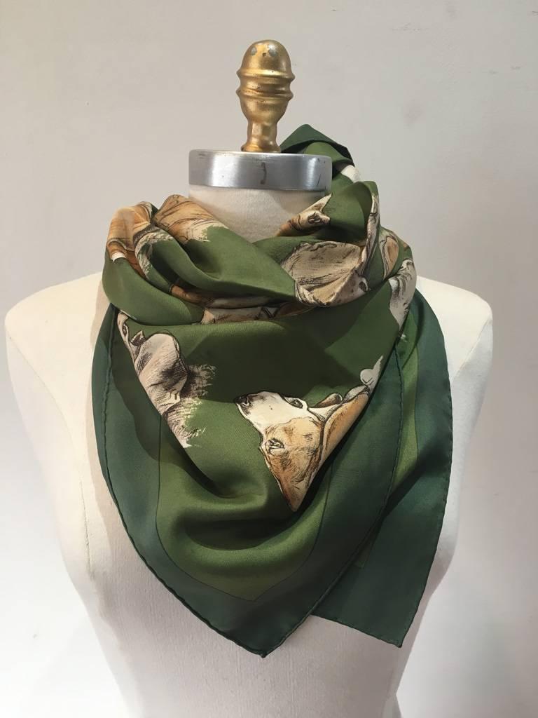 IMMACULATE Hermes vintage Monarch silk scarf in excellent condition.  Original silk screen design c1974 by Xavier De Poret features an array of man's best friend or canine print over a hunter green background with a forrest green border.  100% silk,