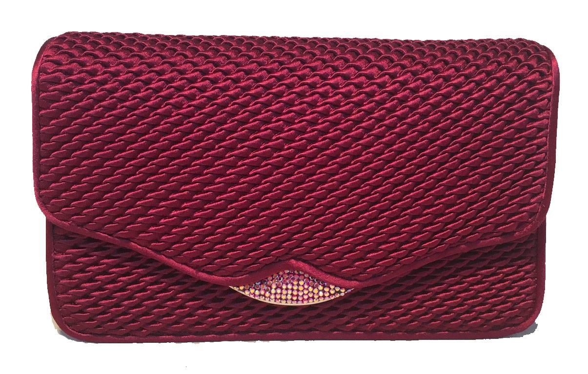 GORGEOUS Judith Leiber vintage satin and swarovski crystal evening bag clutch in excellent condition.  Dark red pinched textured style satin silk exterior trimmed with gold and silver hardware and swarovski crystal details. Front flap snap closure