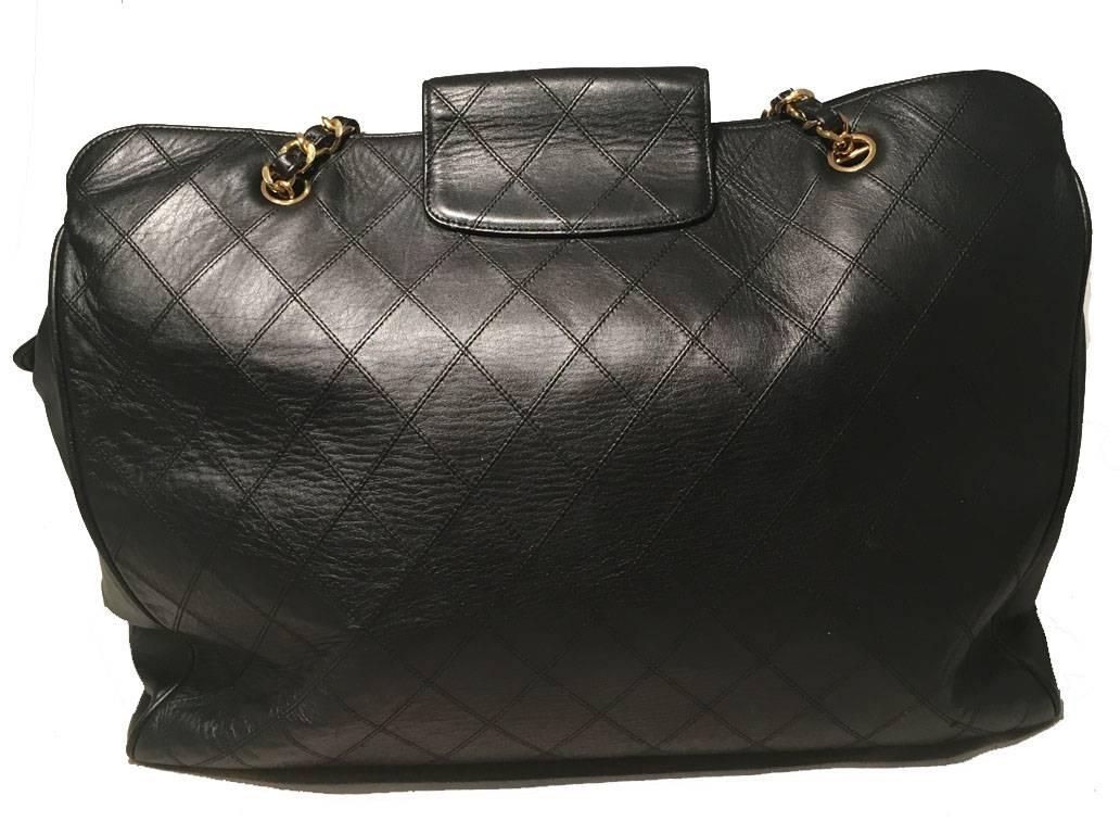 TIMELESS Chanel Model tote in excellent vintage condition.  Black quilted leather exterior trimmed with gold hardware and woven chain and leather shoulder straps.  Top flap with CC logo twist closure opens to a black leather lined interior that