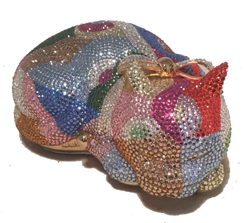GORGEOUS Judith Leiber colorful cat minaudiere in excellent condition.  Multicolor Swarovski crystal body with gold leather base.  Button closure opens to a gold leather interior that holds a side pocket.  Excellent condition, no stains, scuffs, or