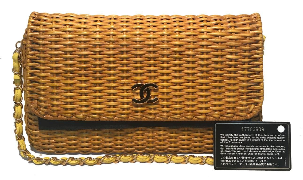 GORGEOUS RARE Chanel basket classic flap in excellent condition.  Tan woven rattan wicker basket exterior trimmed with gold hardware and yellow leather and chain woven shoulder strap.  Front CC logo lift closure opens to a yellow leather lined