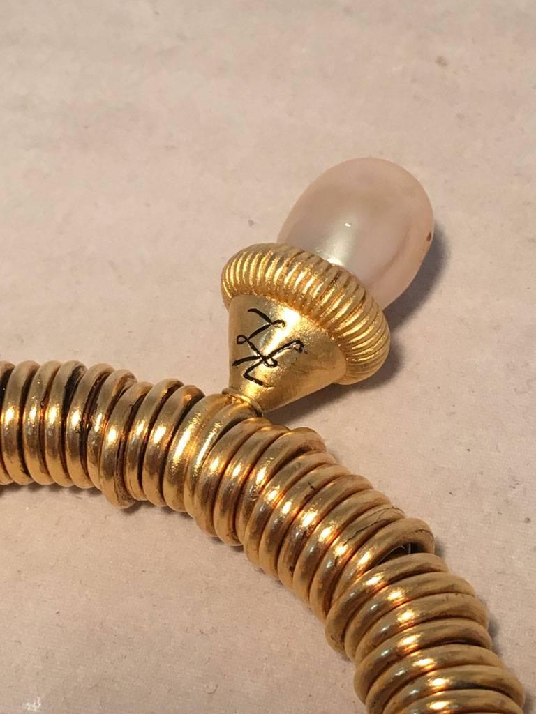 Vintage Kenneth Jay Lane Gold Wire Wrapped Pearl Drop Bangle Bracelet  In Excellent Condition For Sale In Philadelphia, PA