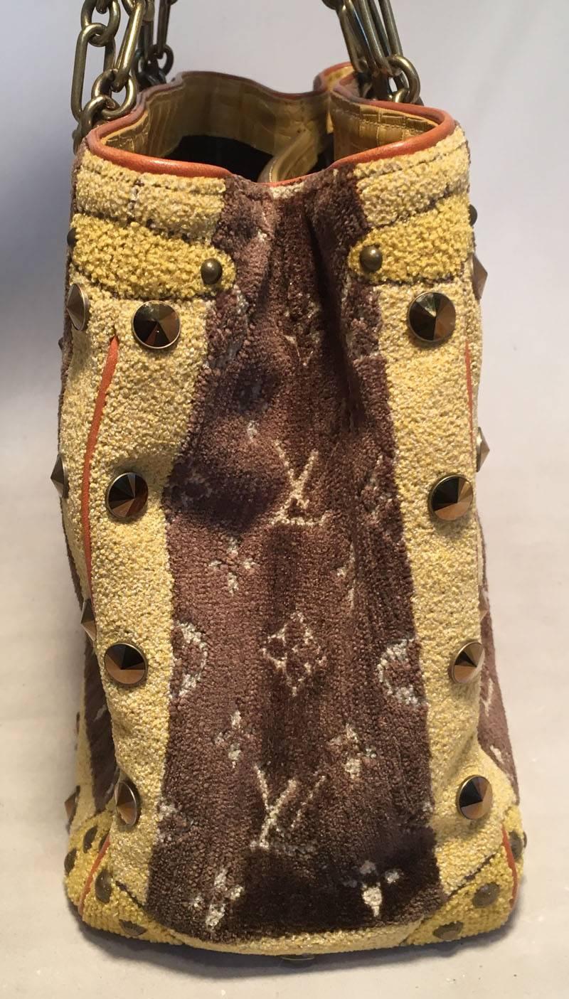 Gorgeous Louis Vuitton Limited Edition Trompe L'oeil Le Fabuleux Shoulder Bag in excellent condition.  Monogram velvet exterior trimmed with tan leather piping around edges, bronze hardware, yellow alligator leather, golden studs, and bronze chain
