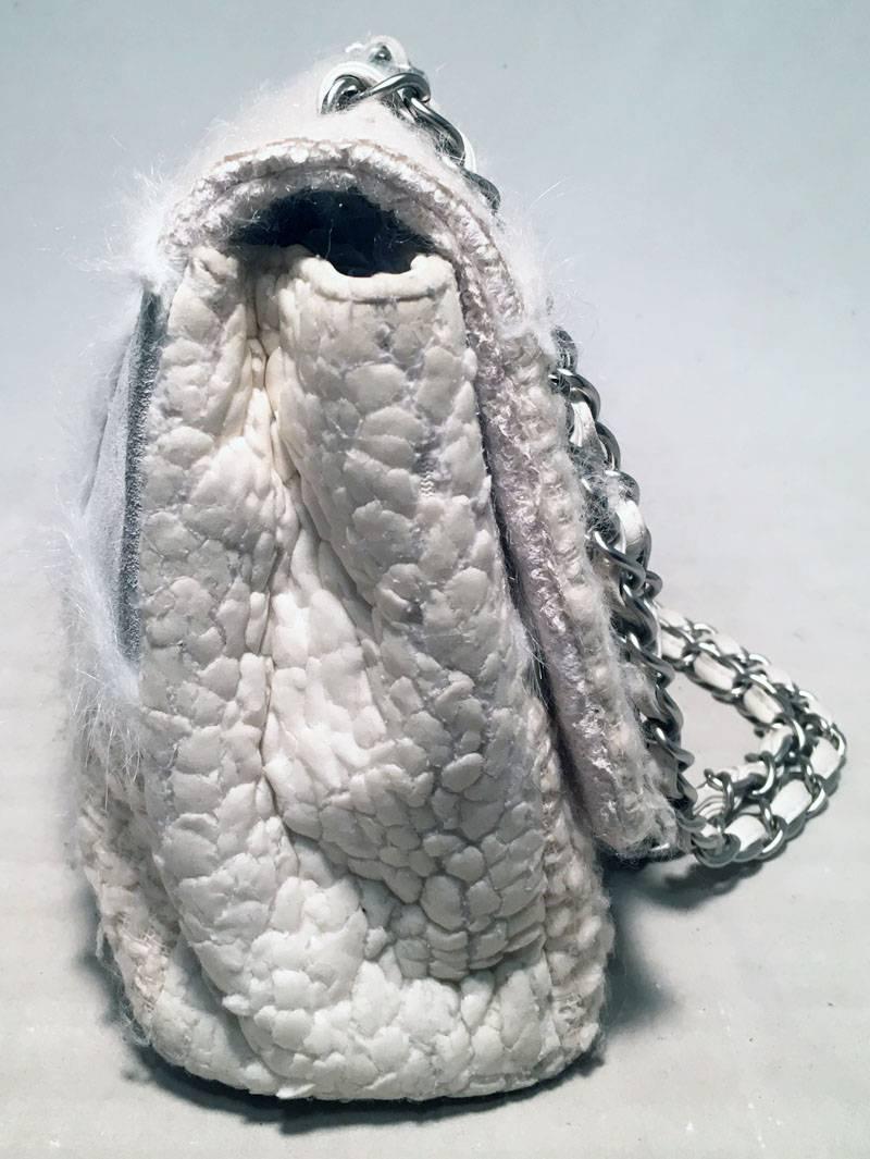 BEAUTIFUL Chanel White Wool and Fur Patchwork Classic Flap Shoulder Bag in very good condition.  White wool, leather, and fur patchwork exterior trimmed with silver hardware.  Front CC logo twist closure opens to an off white silk interior that