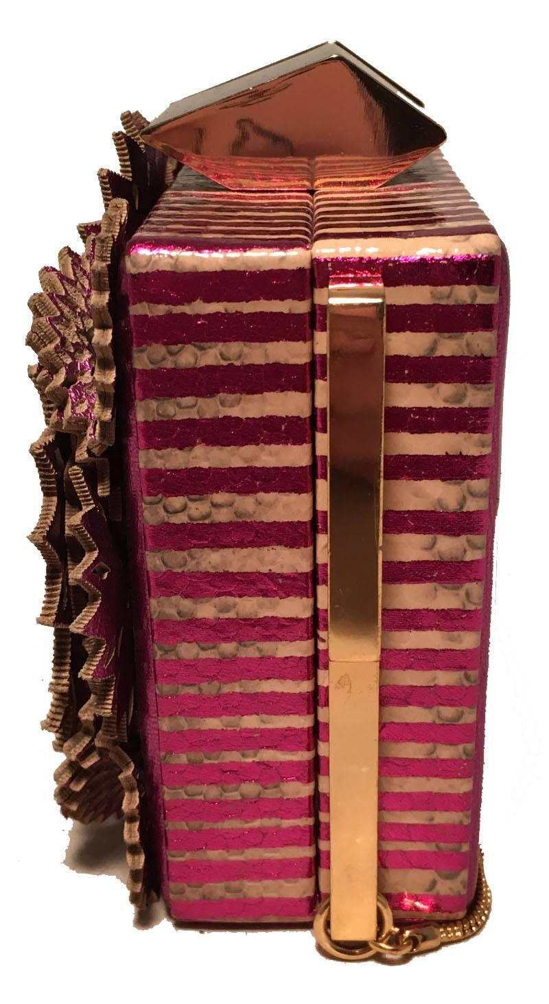 Tonya Hawkes Purple Floral Leather Cut Out Box Evening Shoulder Bag in excellent condition.  Metallic purple leather with striped purple and gold snakeskin edges.  Front side complete with purple and gold leather floral cut outs.  Top latch closure