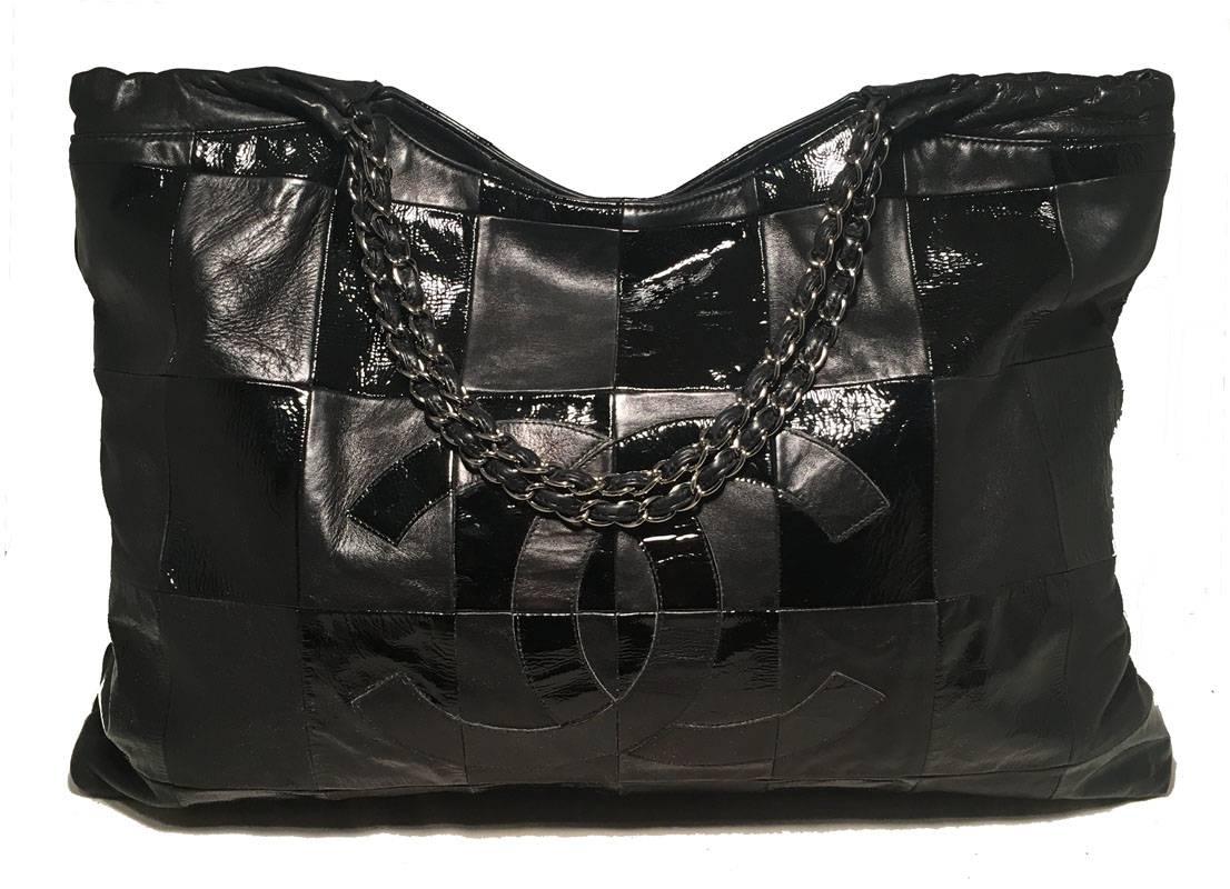 Chanel Black Patent Leather Checkered Shoulder Bag Tote in very good condition.  Black lambskin and patent leather exterior in a checkered pattern throughout complete with CC chanel logo along the front side.  Woven chain and leather shoulder