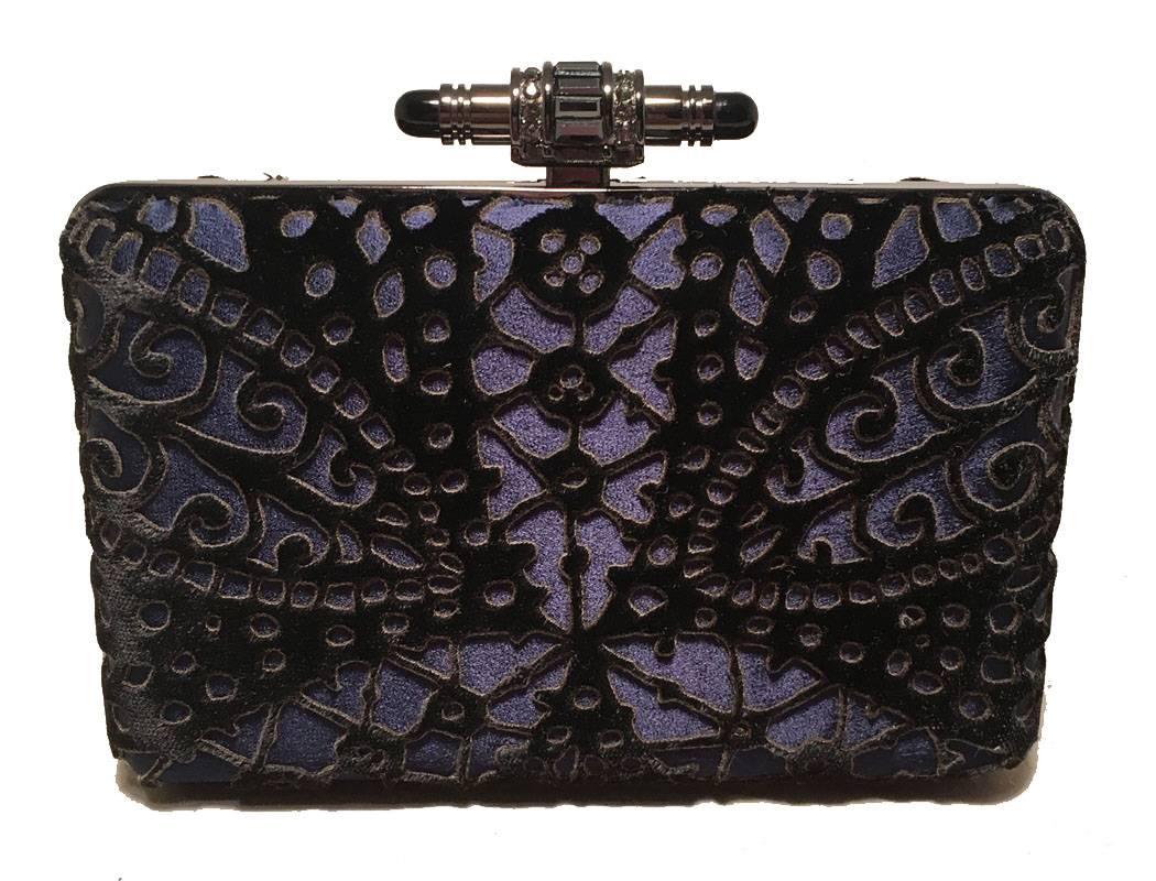 Stunning Judith Leiber Navy Blue Black Velvet Cut Out Evening Bag Clutch in excellent condition.  Navy blue body with black velvet lazer cut overlay in beautiful abstract pattern throughout.  Top lifting closure opens to a silver leather interior