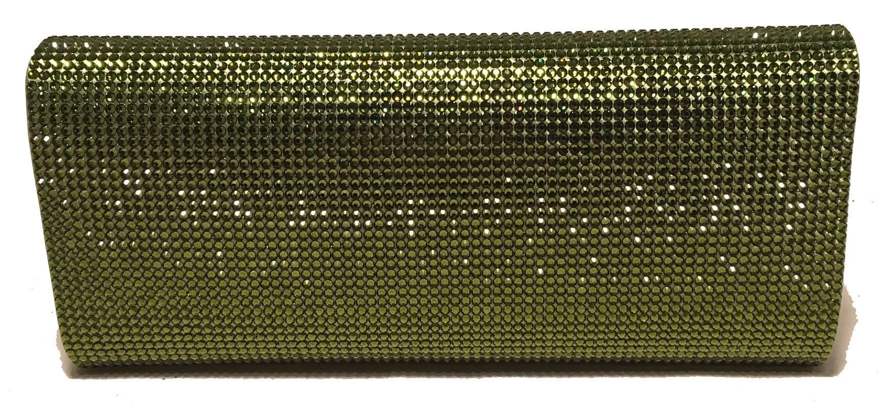 GORGEOUS Judith Leiber Green Crystal Evening Bag Clutch in excellent condition.  Green crystal exterior in classic envelope rectangle shape.  Front flap snap closure opens to green and purple silk lined interior that holds a silver chain handle and