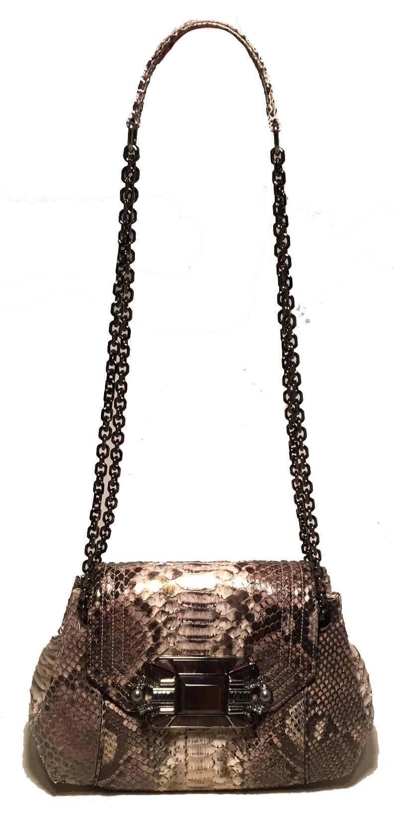 GORGEOUS Judith Leiber Natural Grey Python Snakeskin Shoulder Bag in excellent condition.  Natural grey python snakeskin exterior trimmed with gunmetal hardware, maroon stones and pearls.  Front snap closure opens to a purple silk interior that