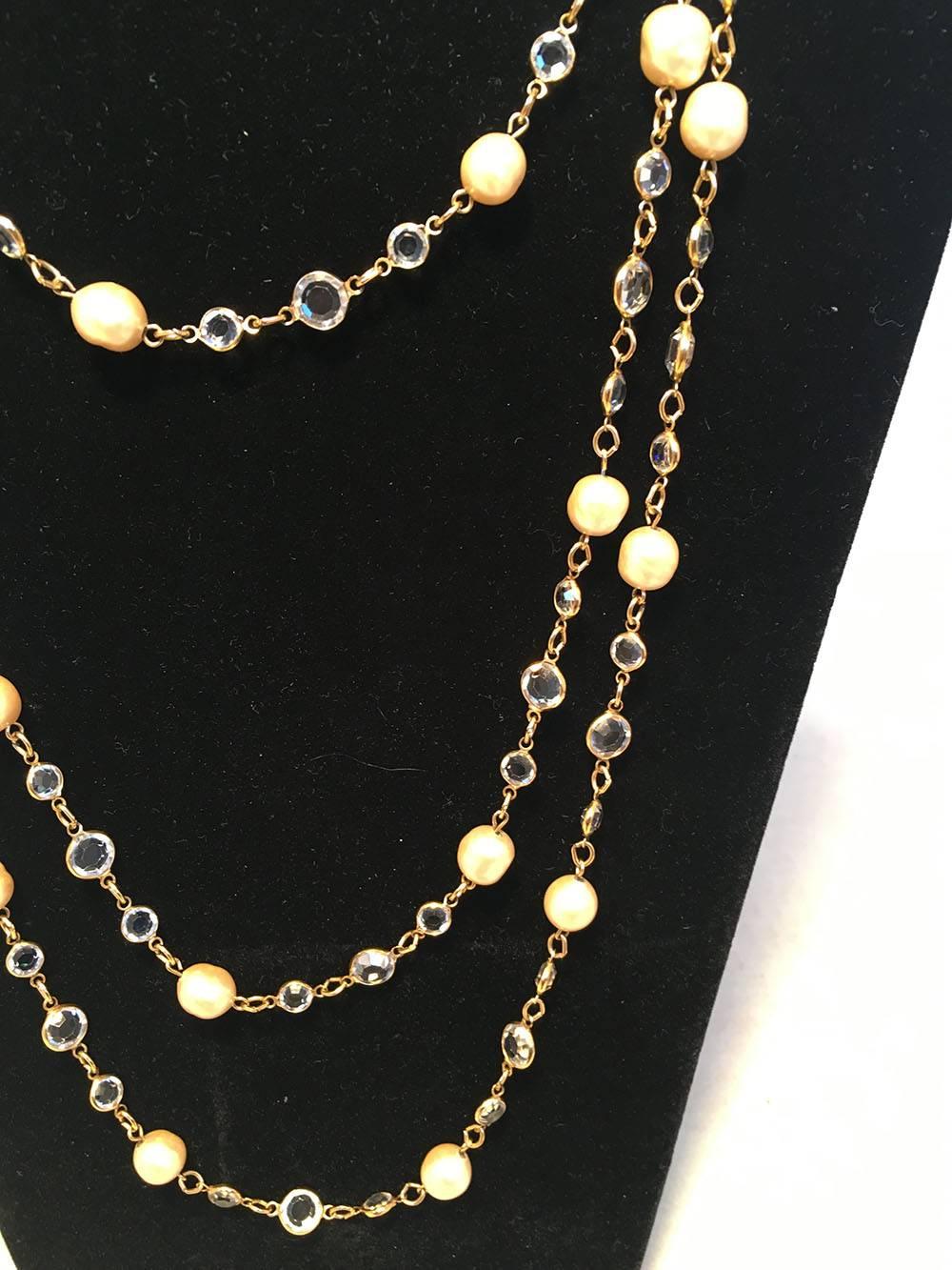 BEAUTIFUL Chanel Vintage Pearl and Clear Crystal Chicklet Long Necklace in excellent condition.  Clear crystal round chicklet style beads with natural shaped oval 1/2