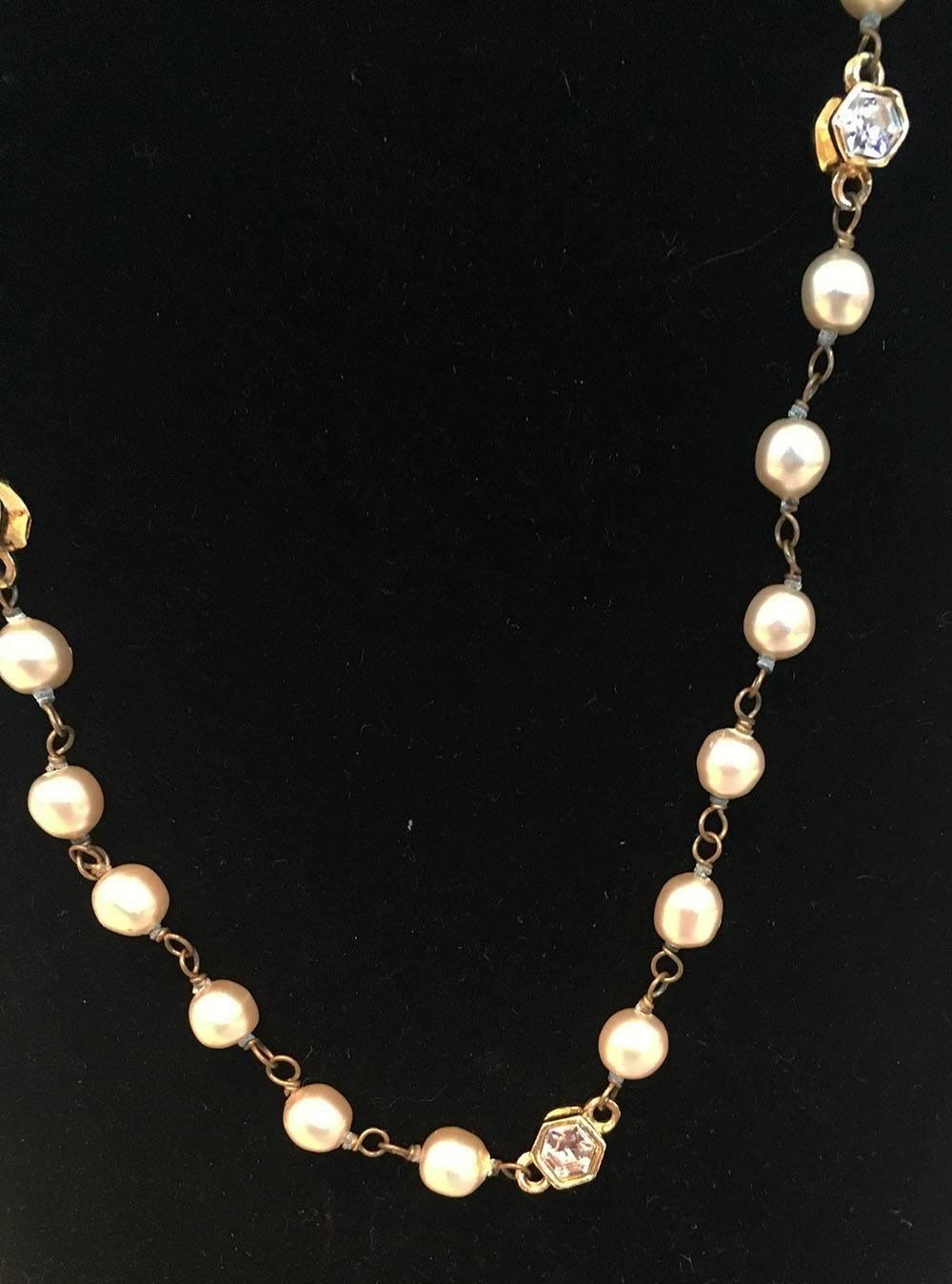 Classic Chanel Vintage Pearl and Small Crystal Beaded Necklace in very good condition. Round pearl beads with small gold hexagon shape beads with centered crystals on 2 sides. Crystal hexagons every 6 pearls. Spring ring closure. Engraved logo charm