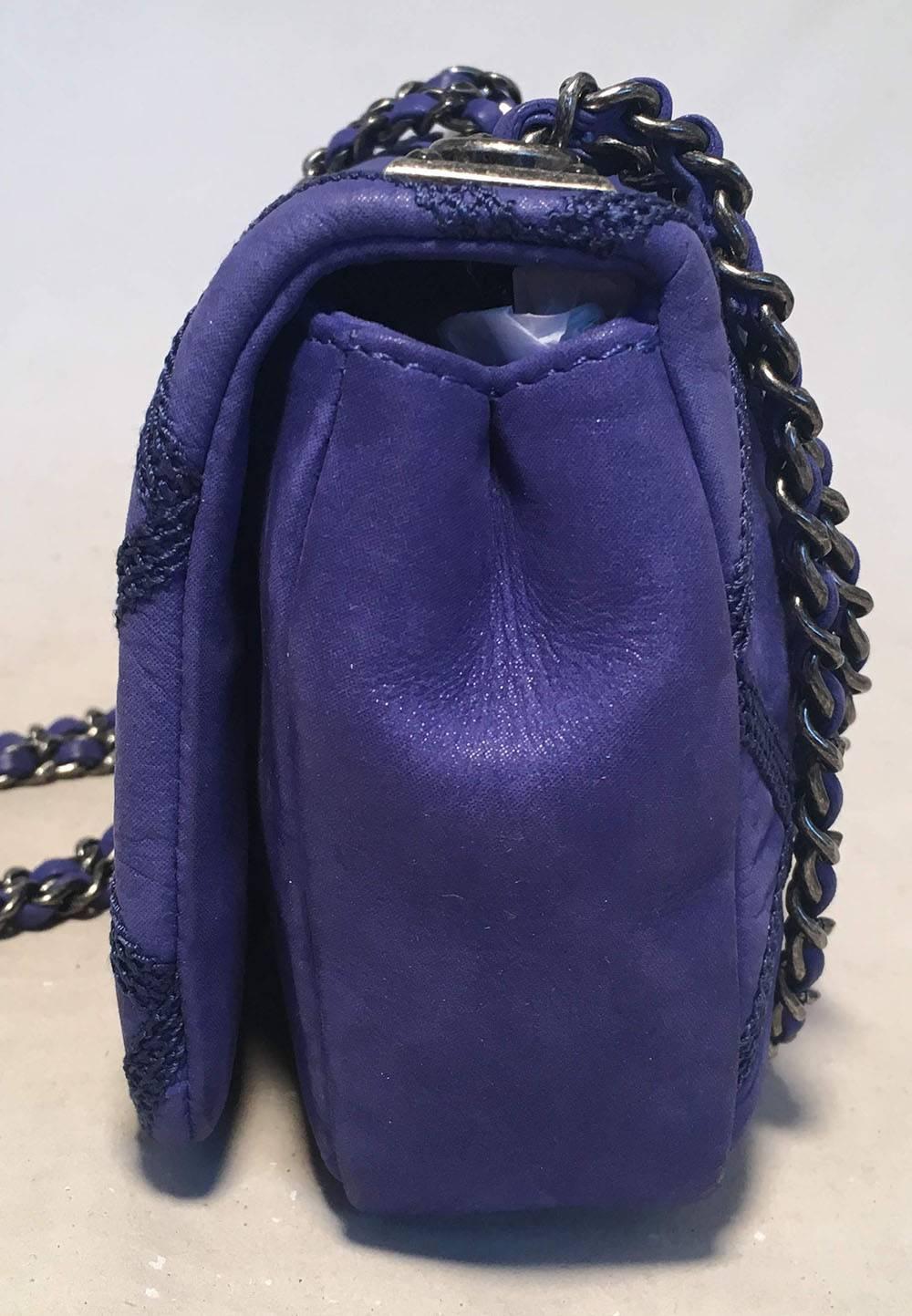 FABULOUS Chanel blue leather topstitch quilted small classic flap in excellent condition.  Electric royal blue leather exterior trimmed with darker blue triple threaded diamond quilted stitching and antiqued silver hardware. Woven chain and leather