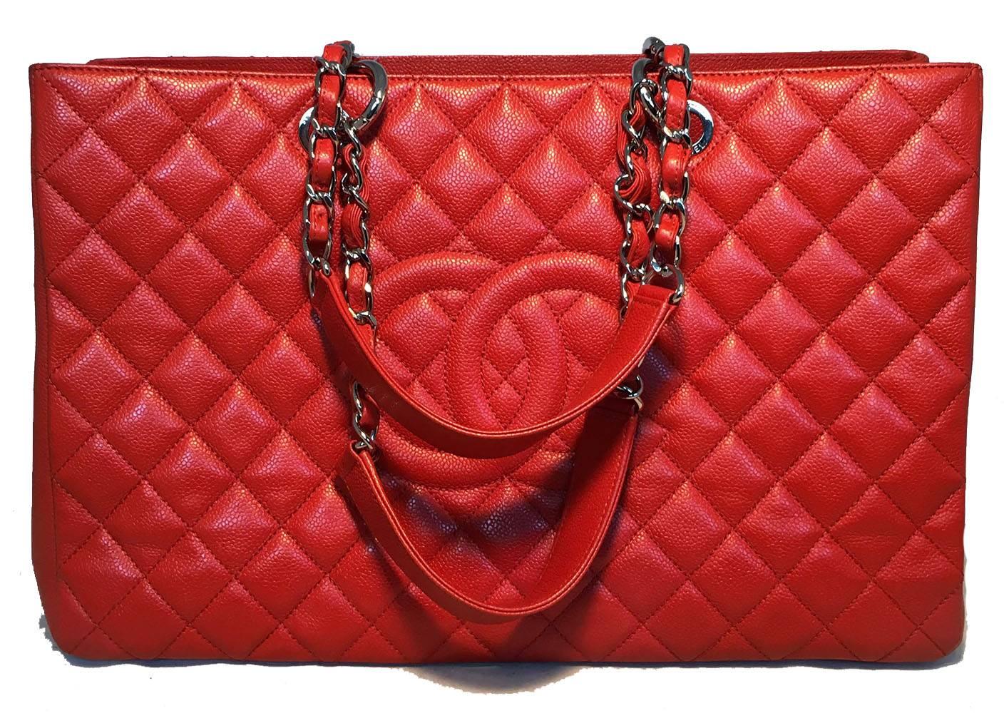 BEAUTIFUL Chanel Dark Red Orange Caviar Quilted Large Shopper Shoulder Bag Tote in excellent condition.  Orange red quilted caviar leather exterior trimmed with shining silver hardware. Interior lined in gray silk and holds 2 separate storage