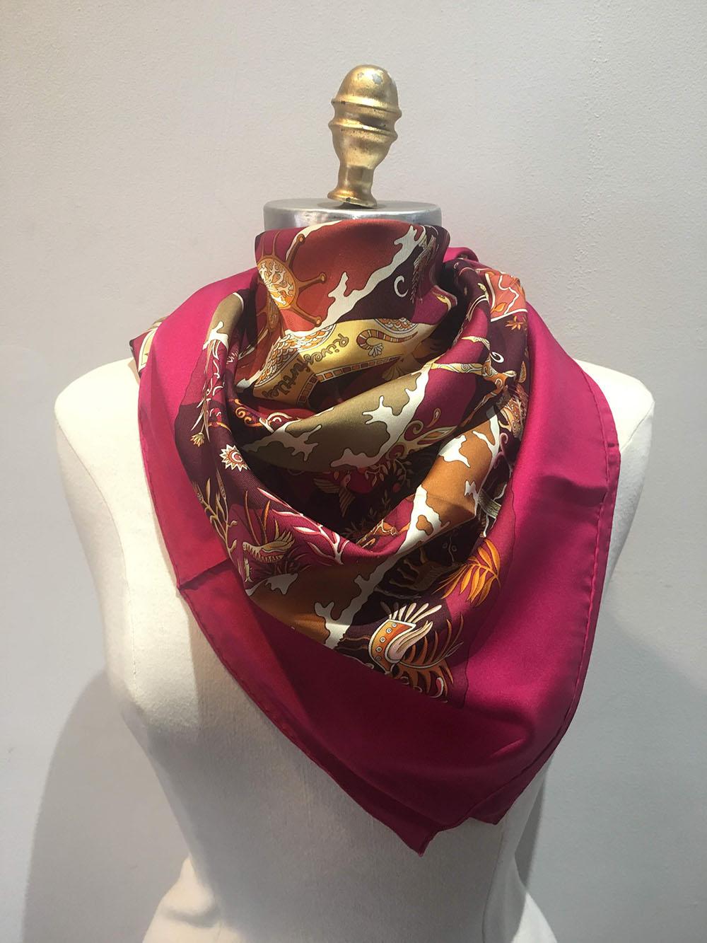 STUNNING Hermes Rives Fertiles Silk Scarf in Magenta in excellent condition.  Original silk screen design by Christine Henry c2005 features an arrangement of various real and mythological floral and fauna found along the fertile river bank of the