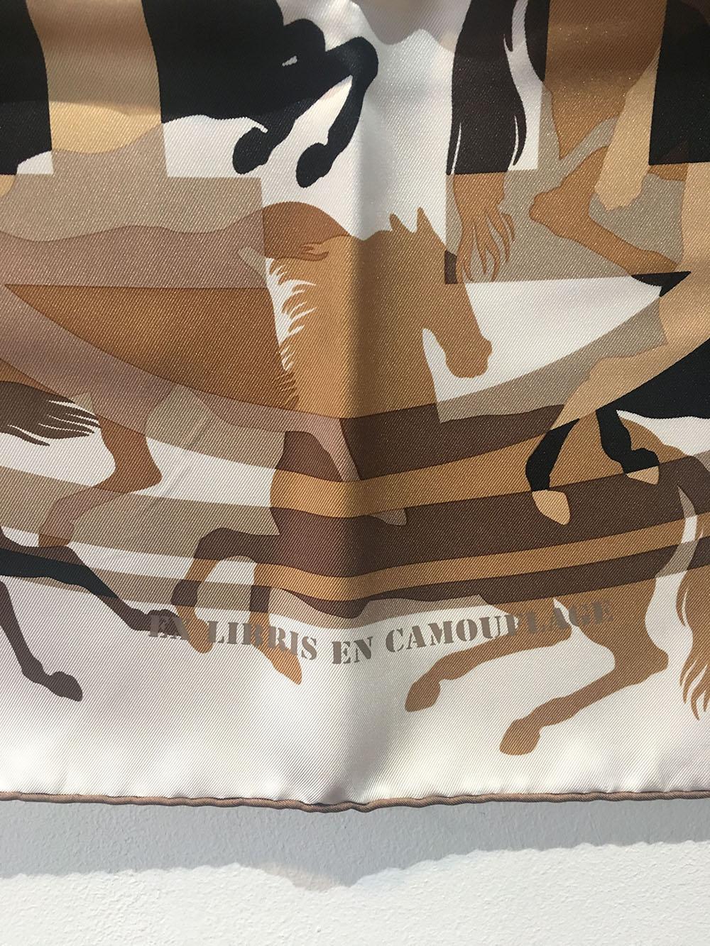 TIMELESS Hermes Ex Libirs en Camouflage silk scarf in excellent condition. Original silk screen design c2010 by Benoit Pierre Emery features a unique camouflage style print with running horses in tans, black, and browns over an ivory background, a