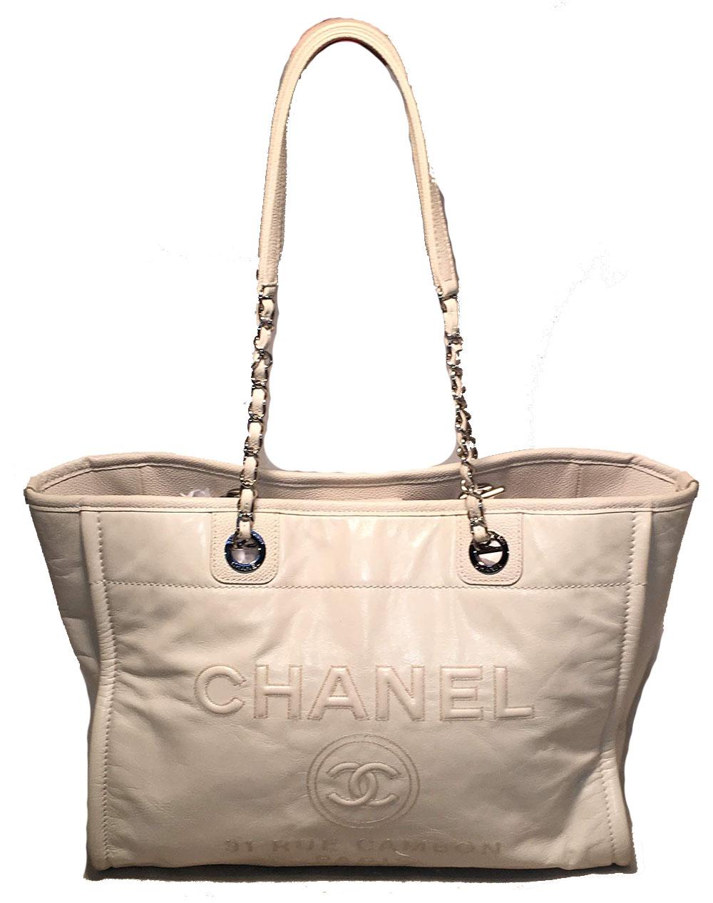 CLASSIC Chanel White Cream Leather Embroidered Rue Cambon Shoulder Bag Tote in very good condition. White leather exterior trimmed with silver hardware, caviar leather and woven chain and leather shoulder straps. Embroidered CC logo with rue cambon