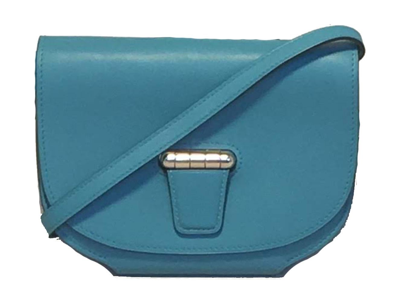 GORGEOUS NWOT Hermes Teal Swift Leather Convoyeur Mini Messenger Crossbody Shoulder Bag in excellent like-new condition.  Teal swift leather trimmed with silver palladium hardware. Unique hinged flap closure opens to matching teal leather interior