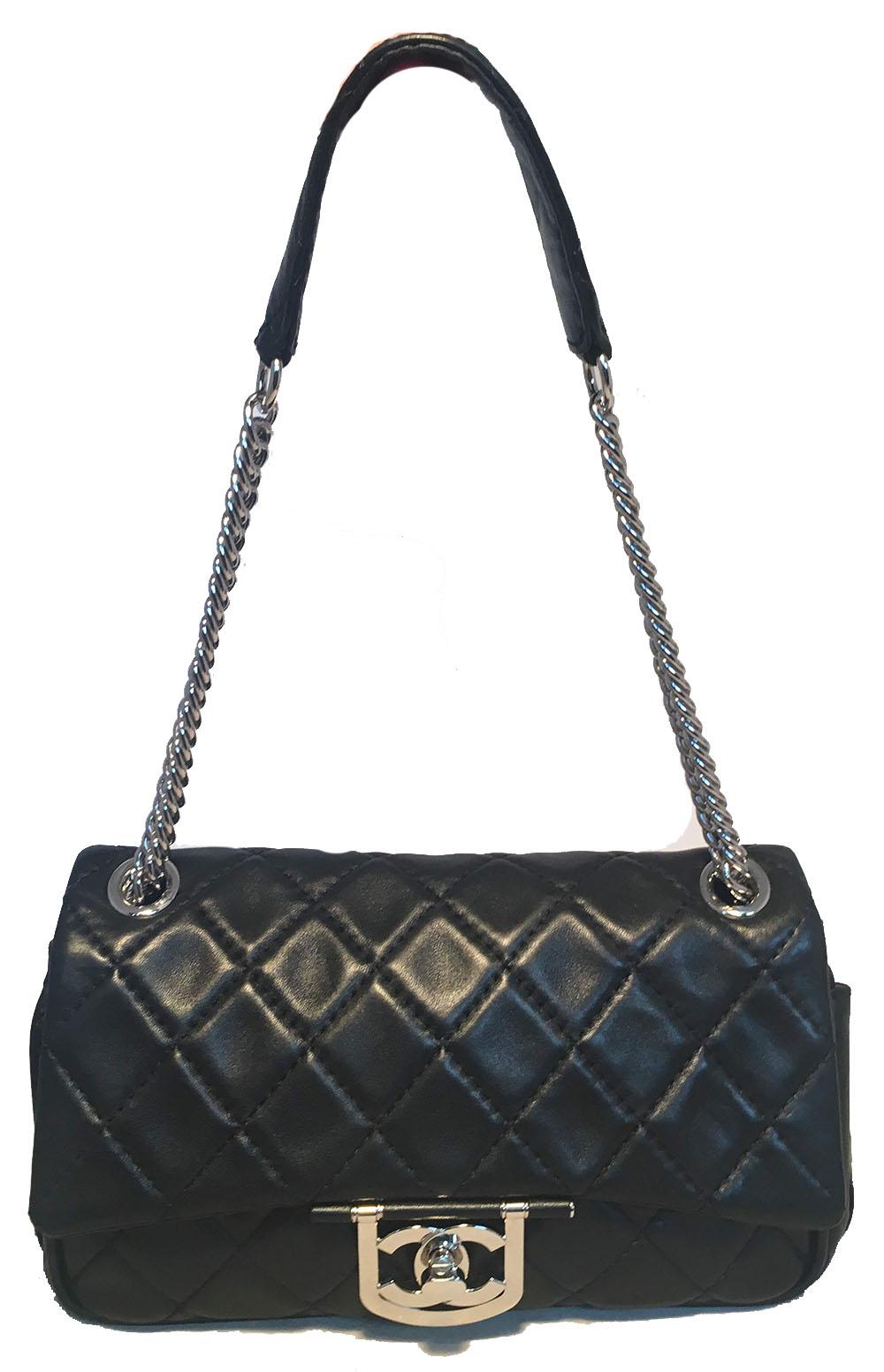 GORGEOUS Chanel Black Leather Classic Flap with Chain Strap Shoulder Bag in excellent condition. Black lambskin leather exterior trimmed with silver hardware. Multiple chain and leather shoulder strap. Unique exterior leather strap design surrounds