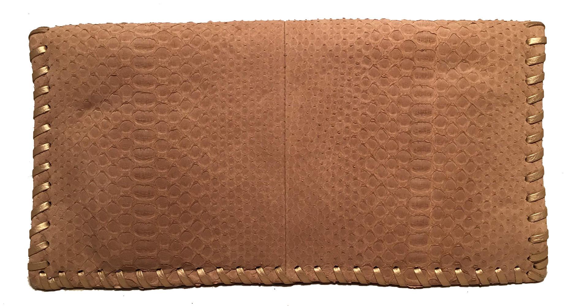 AMAZING Chanel Tan Snakeskin Leather Patch Gold Stitched Jeweled CC Fold Over Clutch in excellent condition. Tan snakeskin exterior trimmed with a tan leather CC logo along the front flap and gold leather wrap stitching along sides and patch logo.