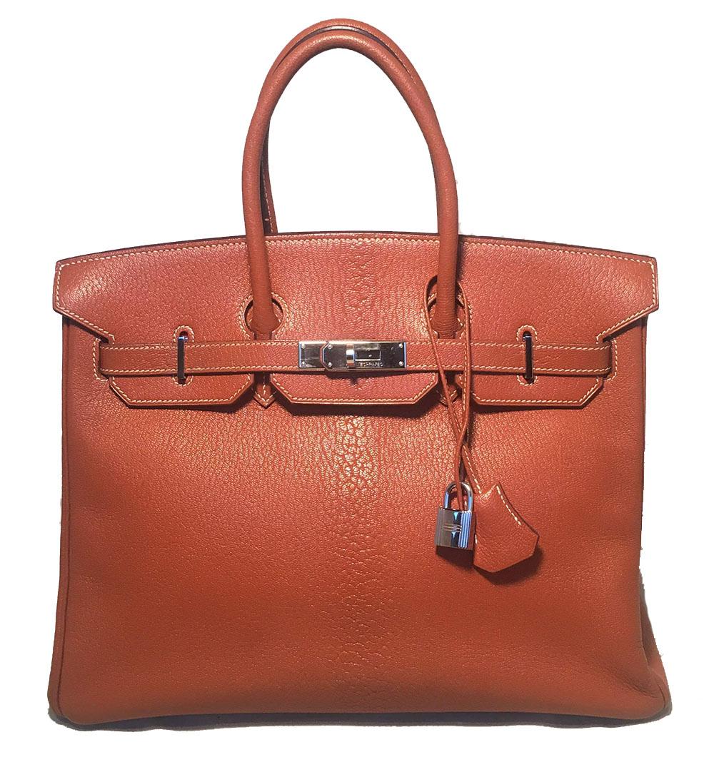 BEAUTIFUL Hermes Tan 35cm Chevre Coromandel Leather Birkin Bag in excellent condition. Dark tan chevre coromandel leather trimmed with silver palladium hardware. Signature twisting double strap closure opens to a matching tan leather interior that