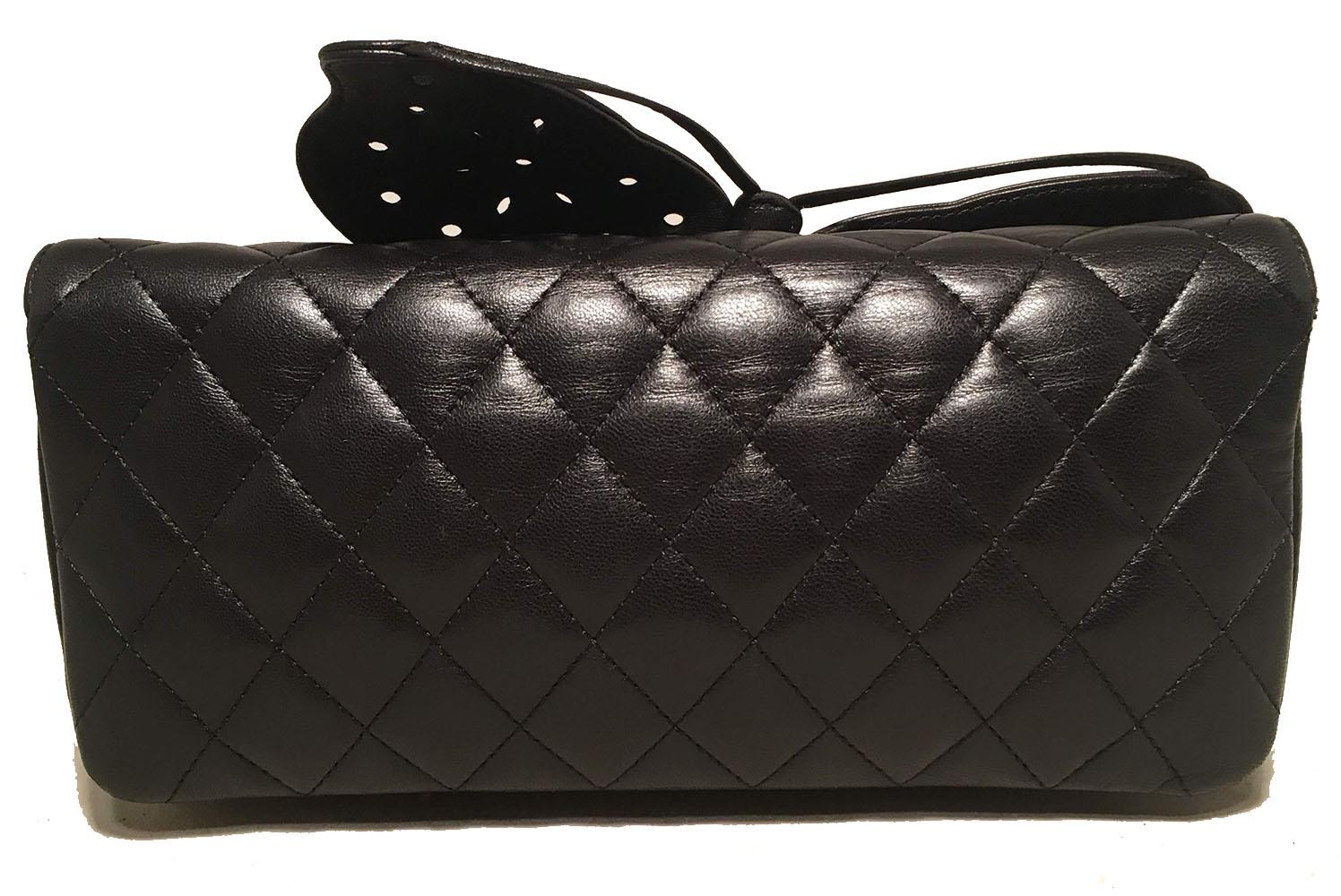 ADORABLE Chanel Quilted Black Leather Butterfly Classic Flap Shoulder Bag in excellent condition. Signature diamond quilted black lambskin leather exterior trimmed with silver hardware and a unique leather laser cut butterfly along the front flap.