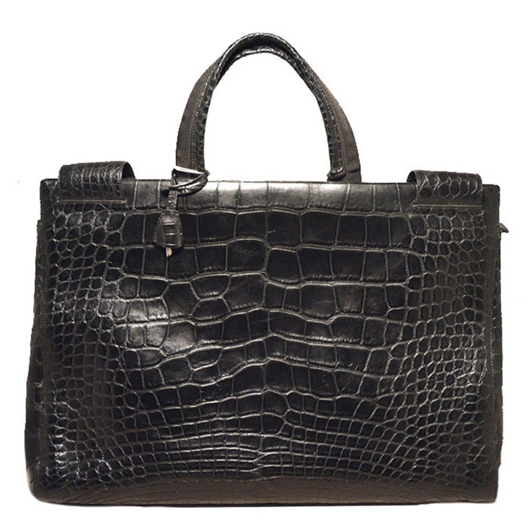 STUNNING PRADA black alligator style portfolio tote in excellent condition.  Black alligator style leather exterior trimmed with silver hardware and a lock and key with clochette.  Double velcro top closures open to a magnificent black satin lined