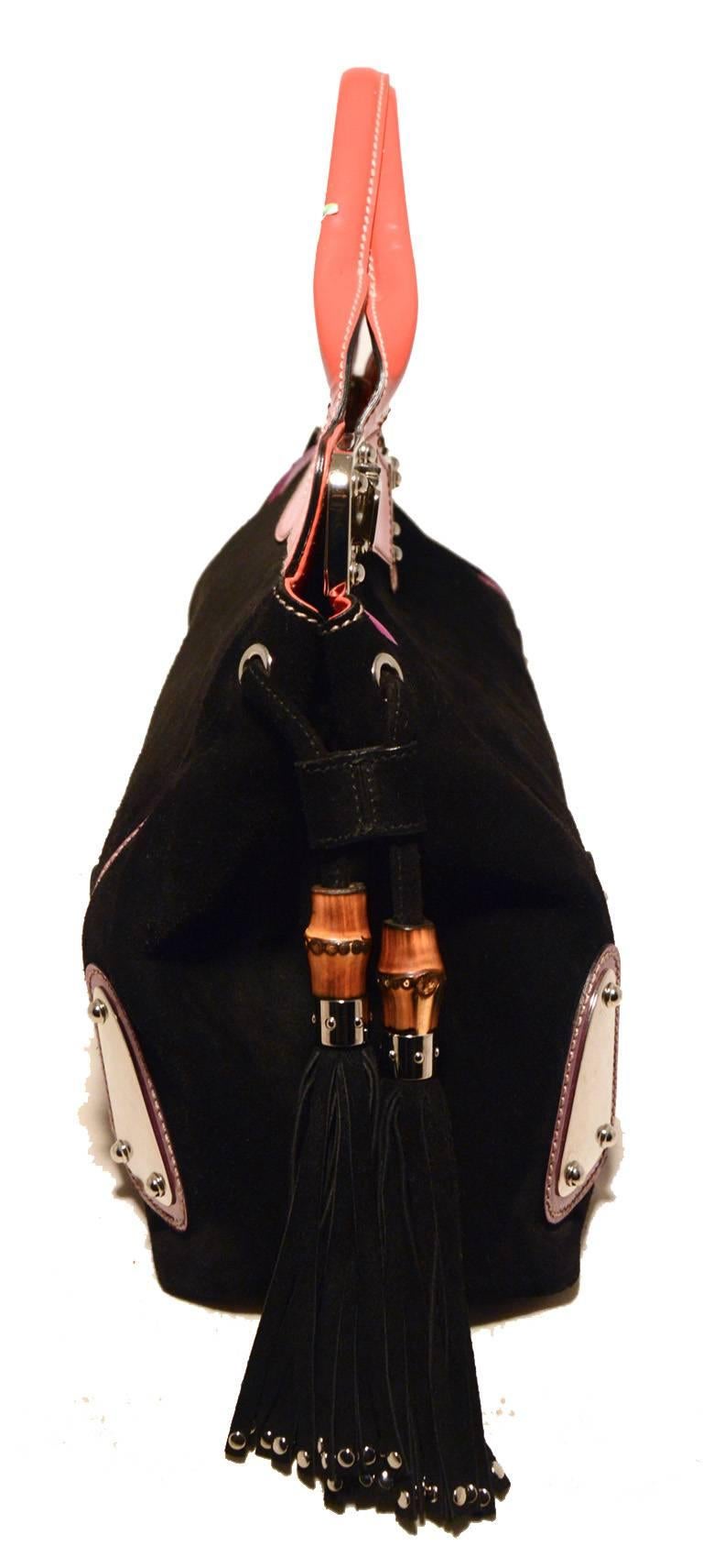 handbag with suede tassels