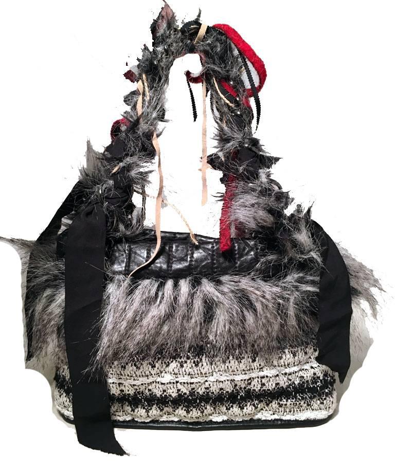 Gorgeous Chanel tweed fur and ribbon handbag in excellent condition.  Multi color black white grey and red exterior composed of tweed, ribbon, fur, and and leather trim.  CC charm detail along front side.  Black canvas lined interior with 2 slit