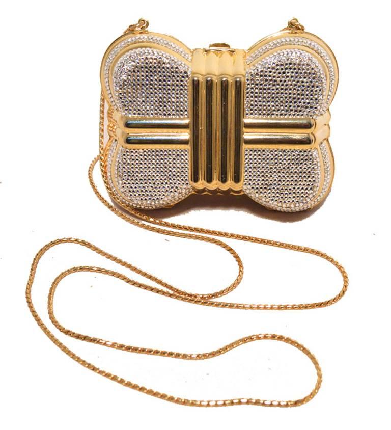 BEAUTIFUL JUDITH LEIBER Swarovski crystal casket minaudiere in excellent vintage condition.  Gold exterior trimmed with clear swarovski crystals in the signature 