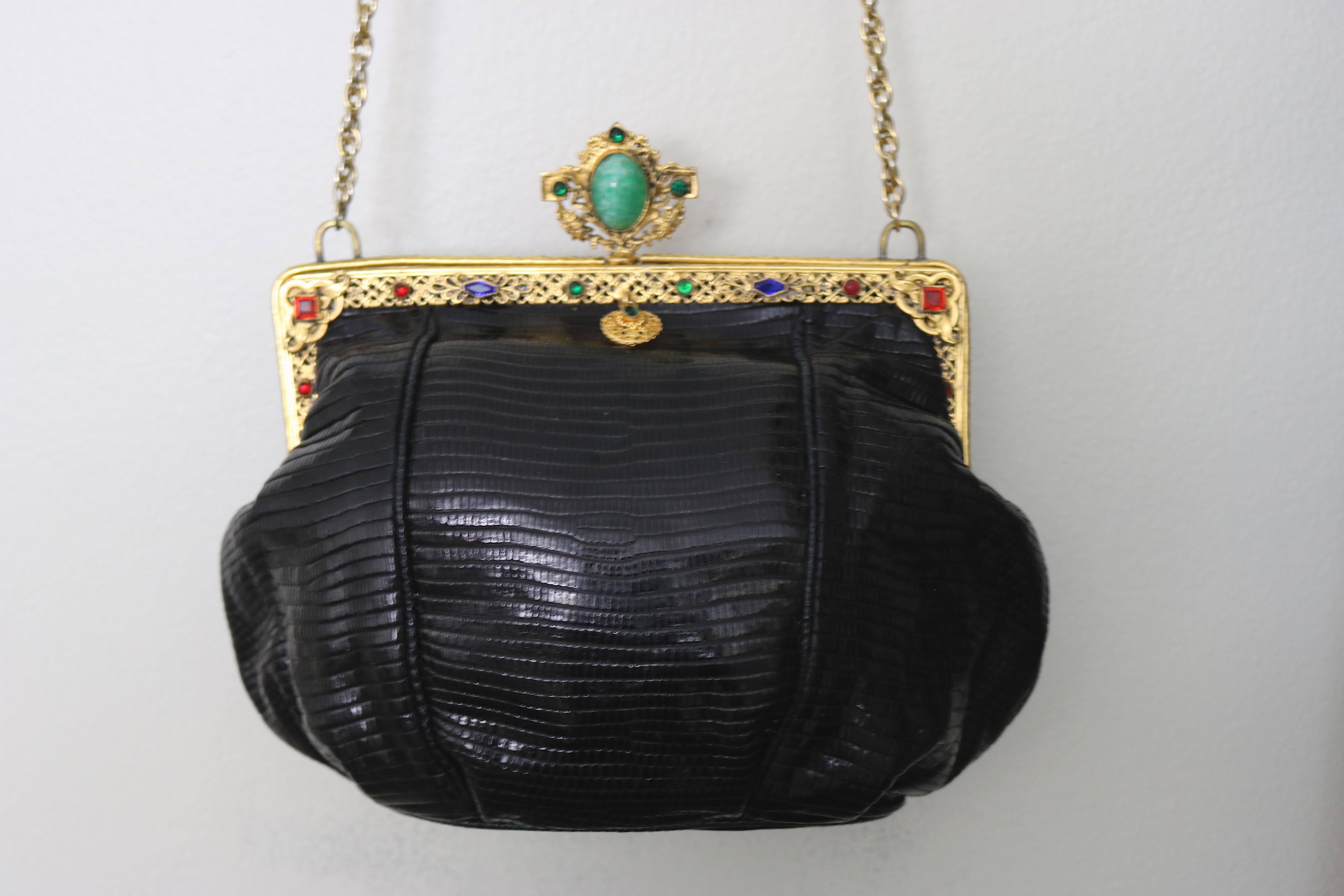 Gorgeous updated for today- lizard black Jeweled Evening Bag designed with a circa 1925 -22 Karat Gold plate Art Nouveau/Art Deco Period Frame with a large floral gold plate surrounded Turquoise Faux Gem Cabochon clasp on top. The frame is