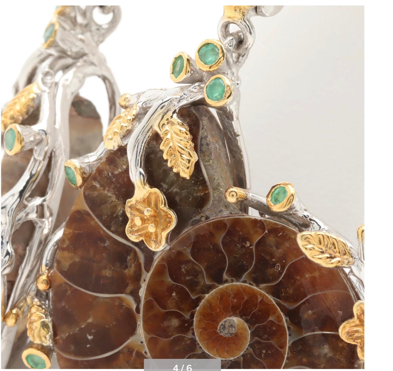 Absolutely extraordinary pair of large Ammonite Fossil Shell Sterling/Gold Drop Earrings-Artisan one-of-a-kind! 
If you think you have seen everything then gaze again--each sterling silver dangle earring features an image of a nautilus shell made