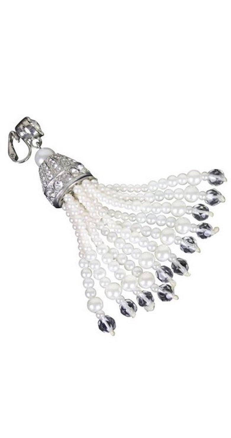 Chic impressive pair of silver plate Runway chandeliers earrings- round CZs with faux pearl topped CZ dome with tassel strings of faux pearls ending in a clear cz crystal.
clip on-   3 1/2