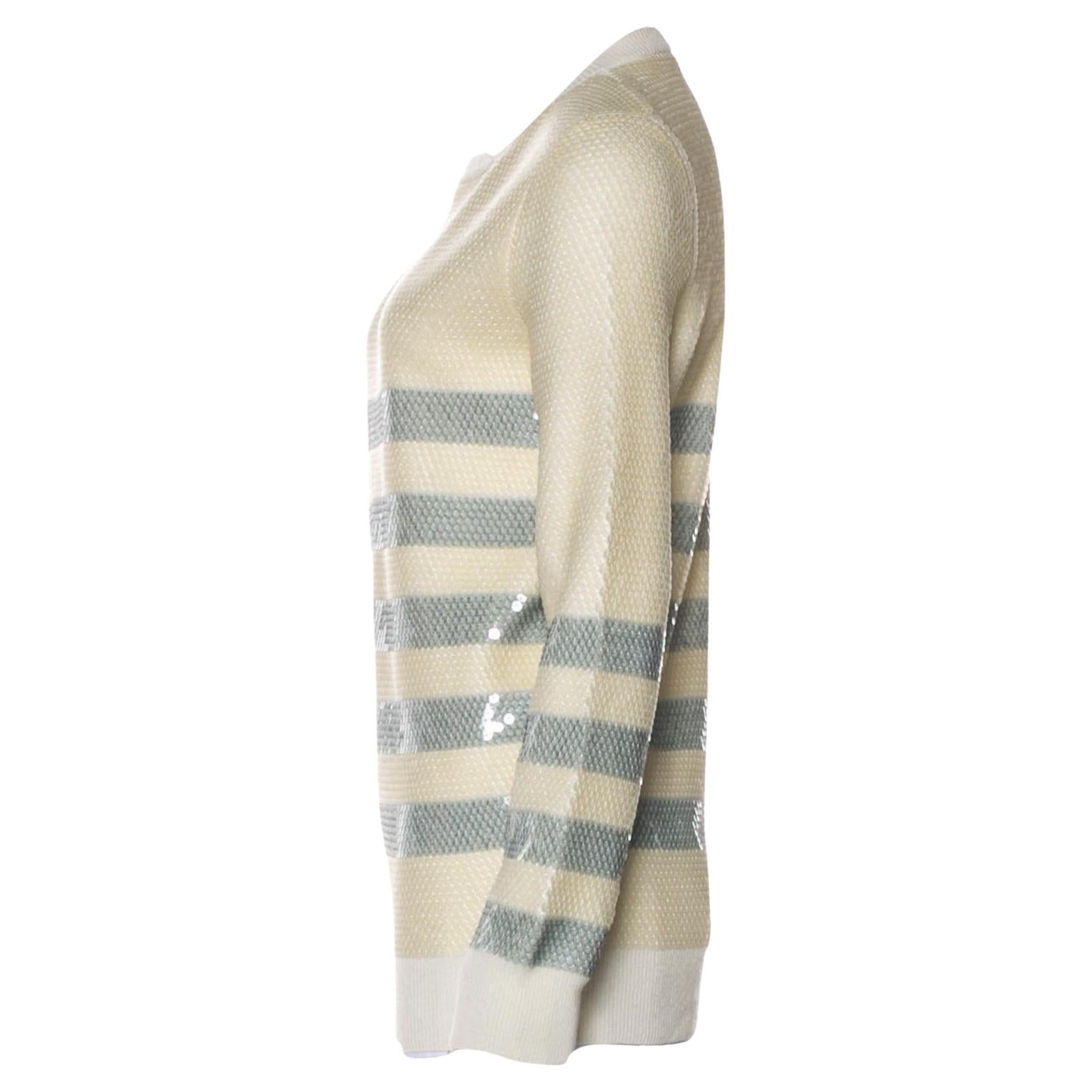 Gucci
Brand New 
Beautiful 100% Cashmere Sweater
Resort 2015
Featured in Ad, Runway and Video
$1500
Size Small
Creme and Blue Gray
Fully Sequined

Bust: 35