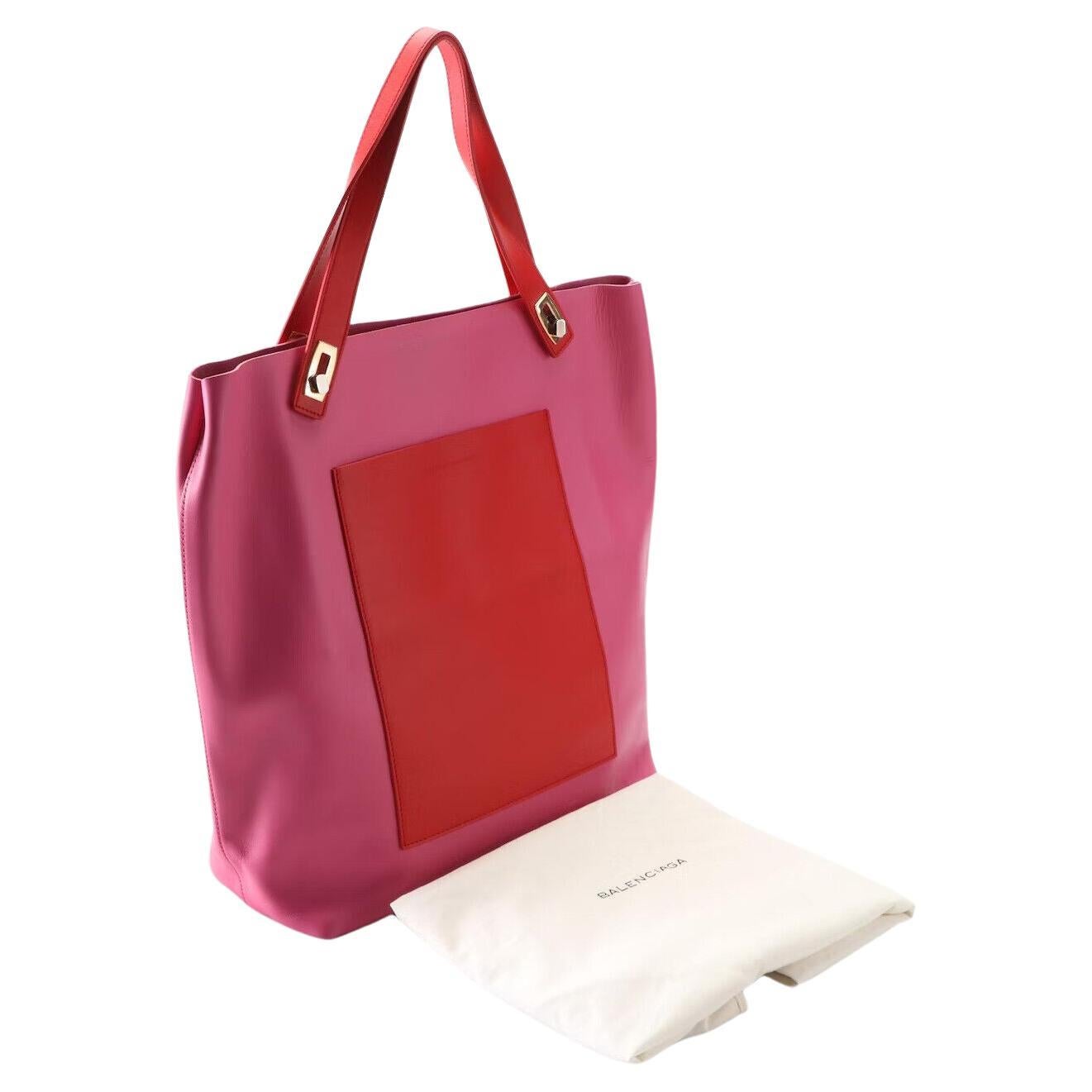 Stunning Balenciaga Tote
New With Tags

Calfskin Leather
Pink & Red

2013 Pre-Fall Collection
2013 Date Code

12.0
