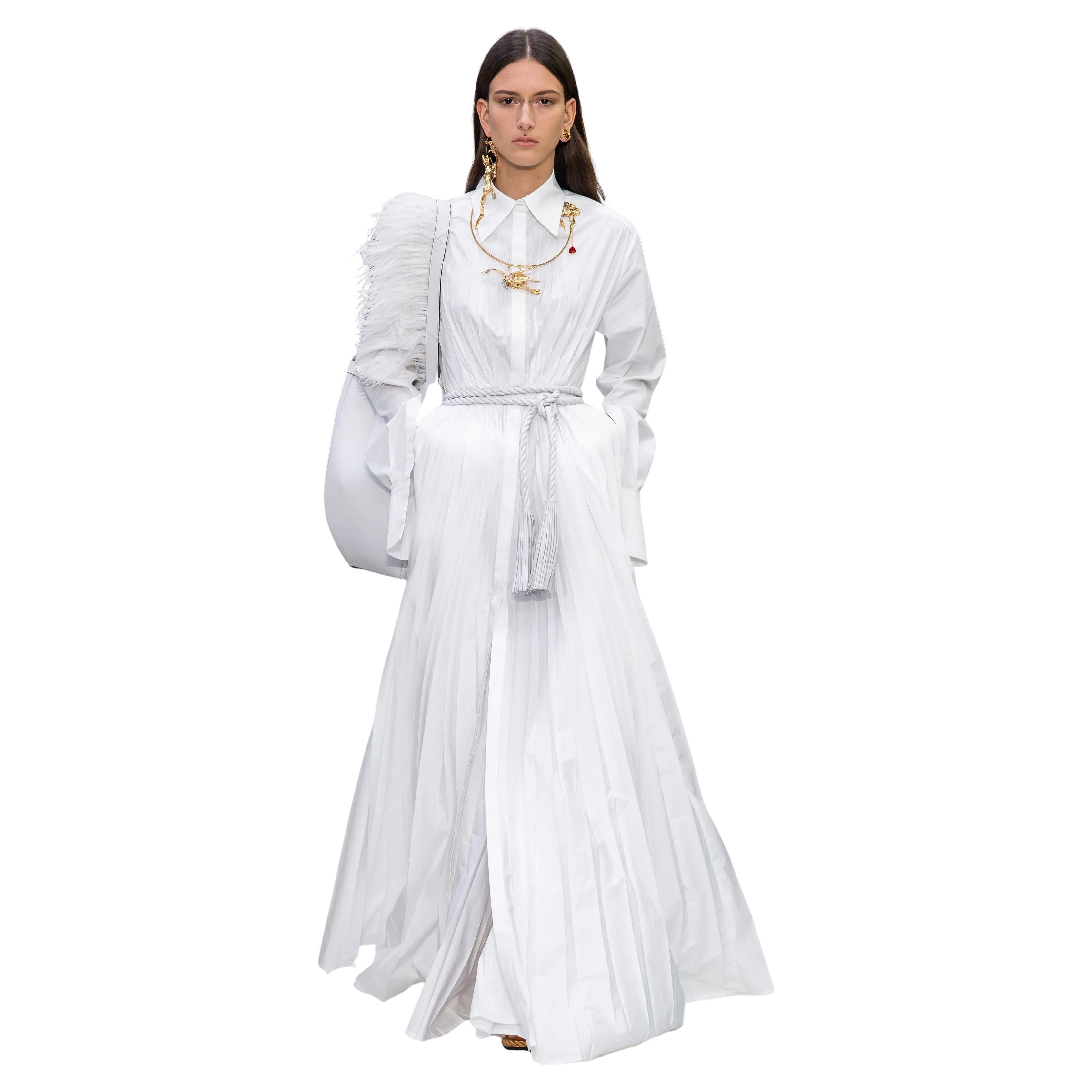 Valentino
Brand New With Tags
Studded & Ostrich Feather Accents
$2795

Bucket Bag
White Leather
Rockstud Accents
Gold-Tone Hardware
Single Shoulder Strap

Leather Lining
Open Top
Includes Interior Zip Pouch

Shoulder Strap Drop: 15.25
