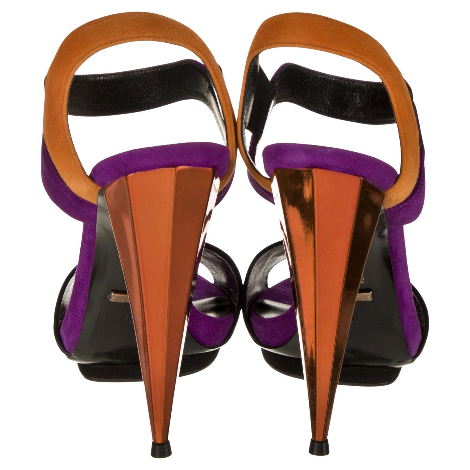 Who makes Gucci shoes?