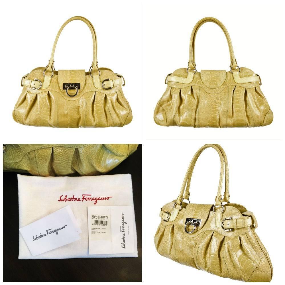 Rare Ferragamo Ostrich Bag
Brand New & Authentic
* Absolutely Breathtaking!
* Yellow ostrich LEG & karung snake handles
* Silver Hardware & sand suede lining
* One long interior zippered pocket
* Open inside pocket and cell phone pocket
* Gancini