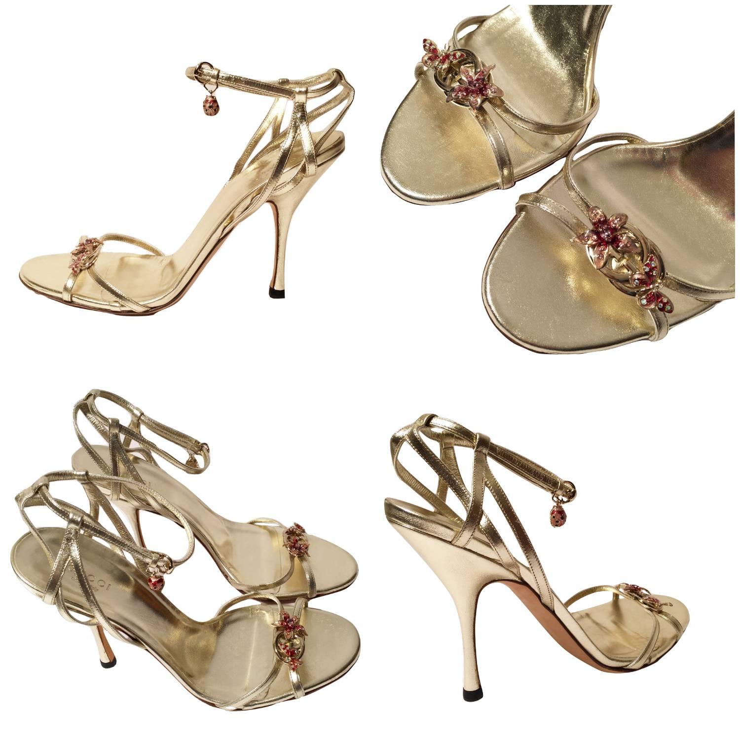 Lt. Edition Gucci Heels
Brand New
* Stunning in Gold Leather
* Flower & Butterfly Jeweled Toe
* Lady Bug Dangle Jewel
* Size: 9.5
* Adjustable Ankle Strap 
* Leather Insole
* 4.5