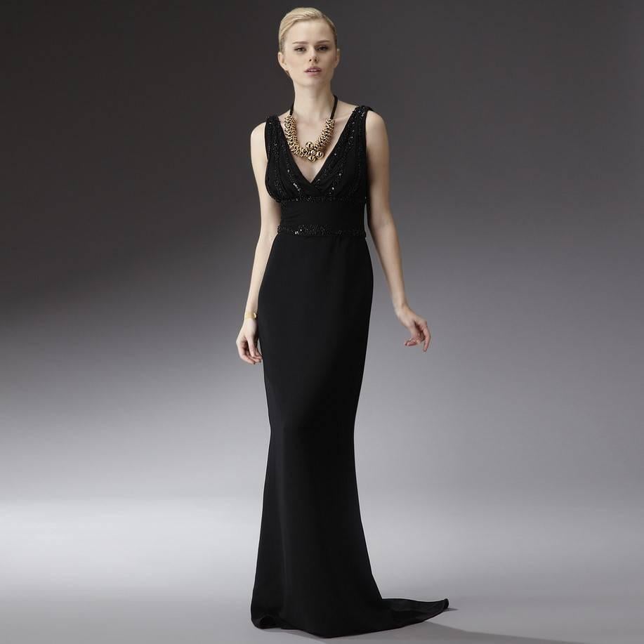 Badgley Mischka Gown
Brand New with Tags
Bead Trim on Bodice and around waist
Zipper and Hook Closure
Pleated Bodice
V-Shaped Front and Back Top
We are happy to provide measurements upon request
Shell: 97% Polyester 3% Spandex
Lining: 100% Polyester
