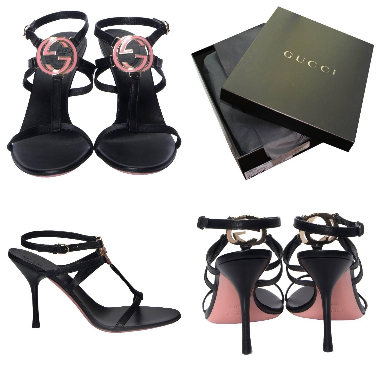 Gucci GG Logo Heels
Brand New
* Stunning in Pink & Black
* Pink & Gold GG Logo Front 
* Size: 10
* Adjustable Ankle Strap
* Leather Insole 
* 4
