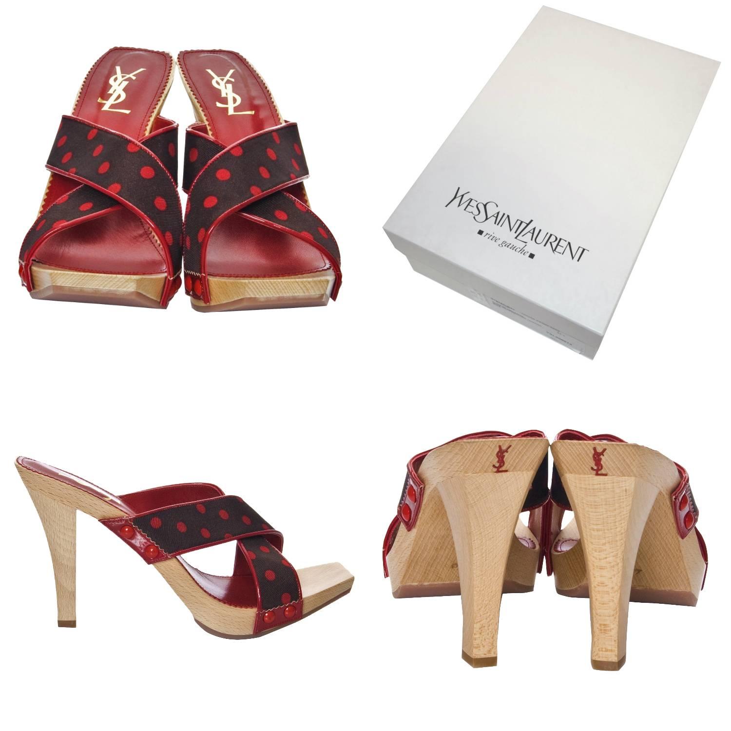 Yves Saint Laurent Heels
Brand New
* Tom Ford Era! This was his last collection for Yves Saint Laurent. He was inspired by the Chinese Collection of 1977 
* Stunning Red & Dark Chocolate Polka Dots
* Criss Cross Toe  
* Red Leather Footbed
* Slip