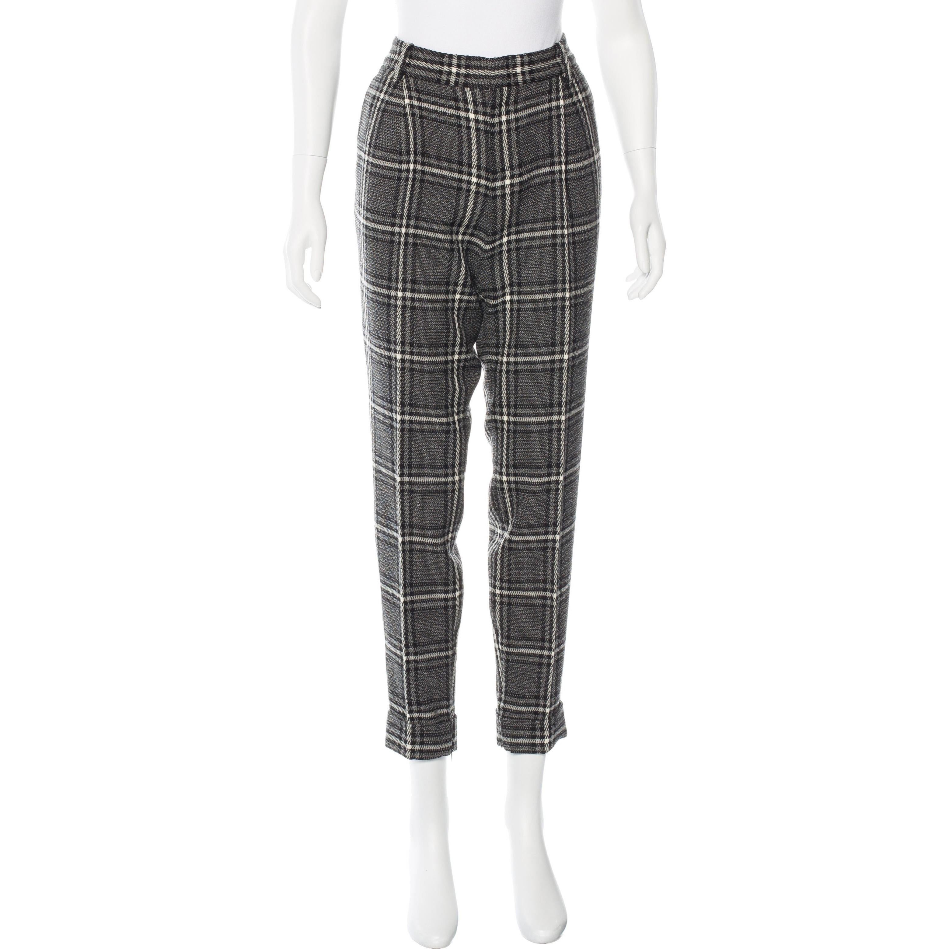 Gucci Wool Plaid Pants
Brand New without Tags
* Gucci Wool Plaid Pants
* Dual pockets at hips
* Dual welt pockets at back
* Italian Size: 44
   Waist:  34
