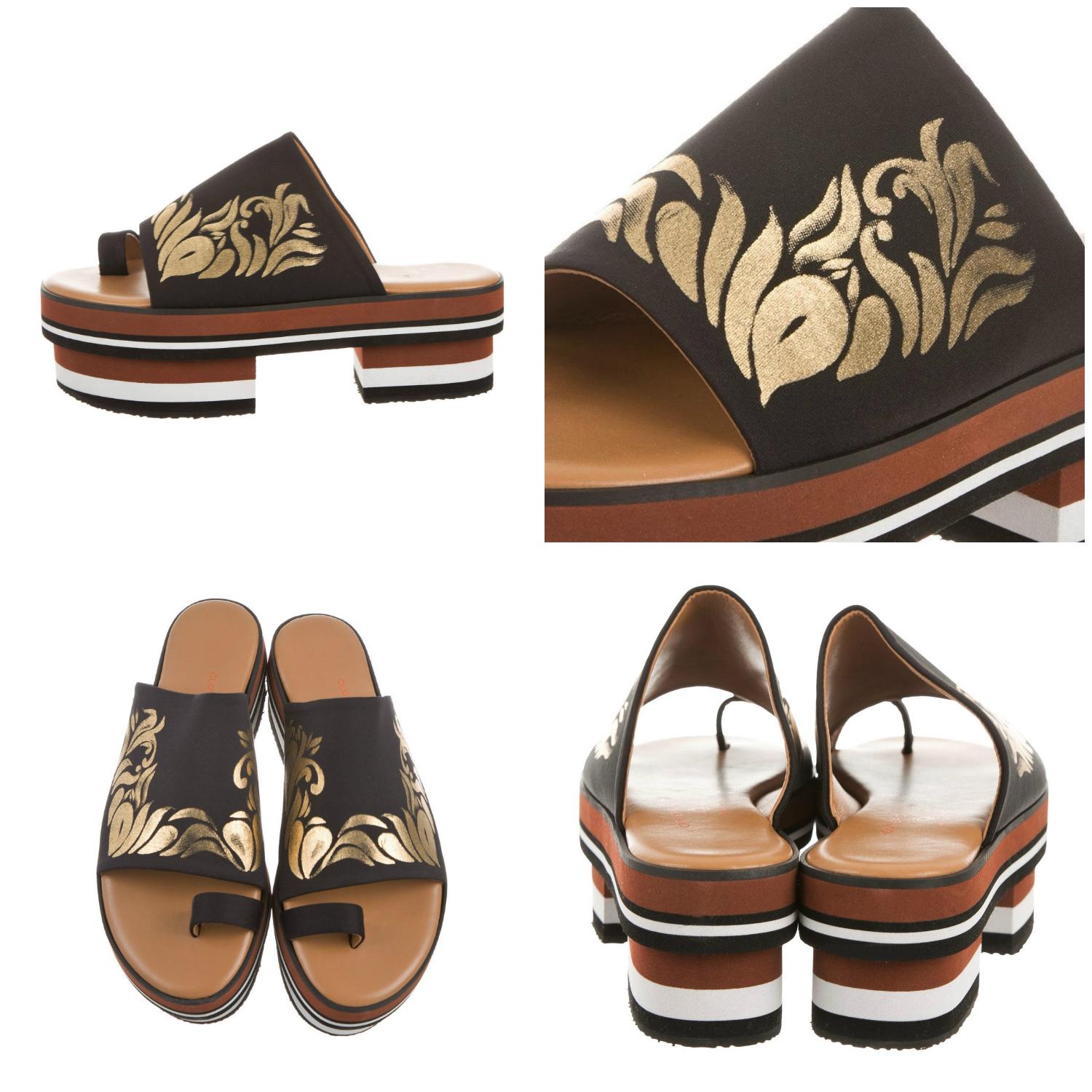 Clover Canyon Geta Sandal
Brand New
* Stunning Japanese Style Platform
* Gold Design 
* Size: 7
* Rubber Soles
* Toe Strap
* Leather Insole
* 2.5