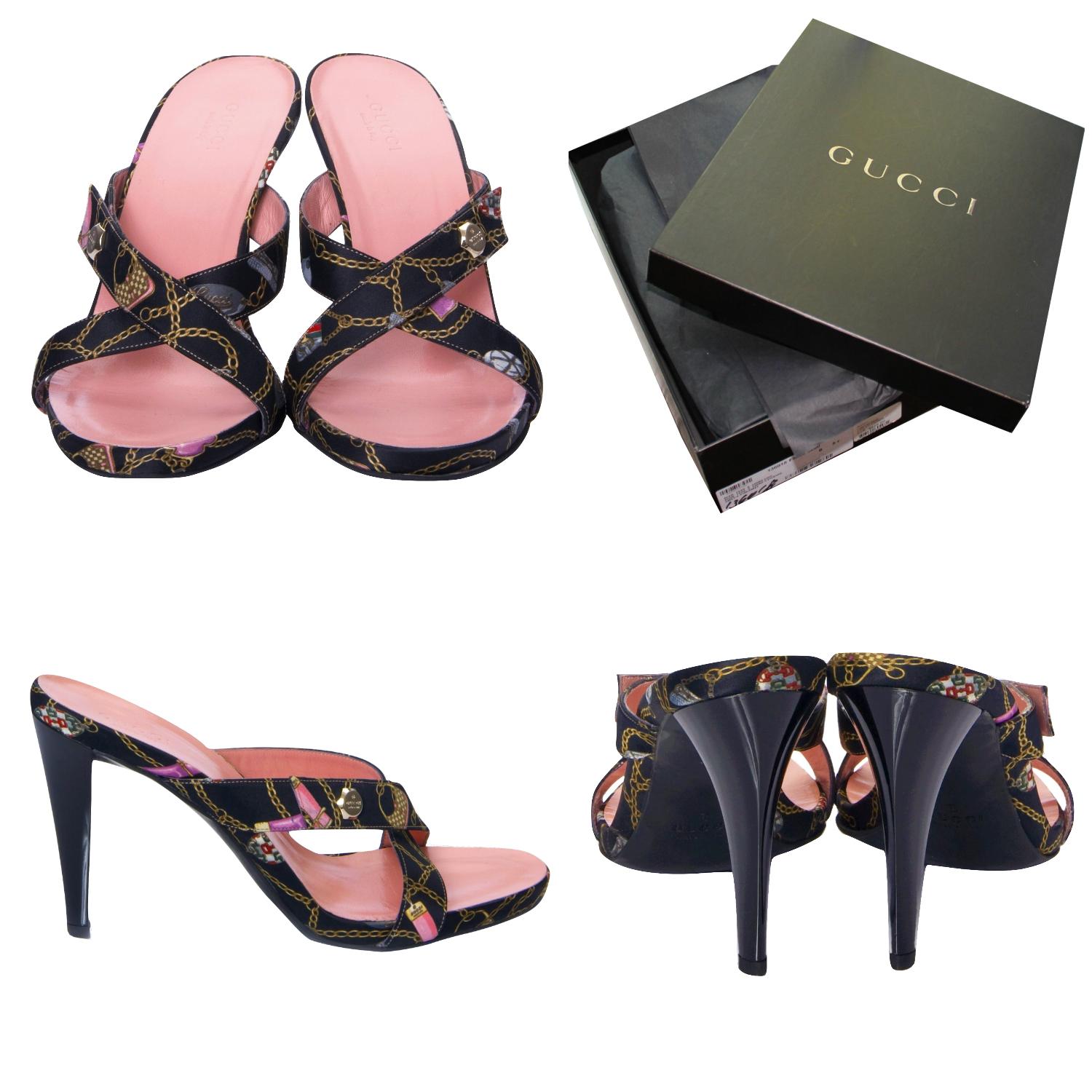 Tom Ford Era Gucci Heels
Brand New
* Stunning Black Logo Satin
* Satin Print in Linked Chains, Handbags, Horsebit
* Black Lacquered Heel
* Soft Pink Leather Footbed
* 1/2