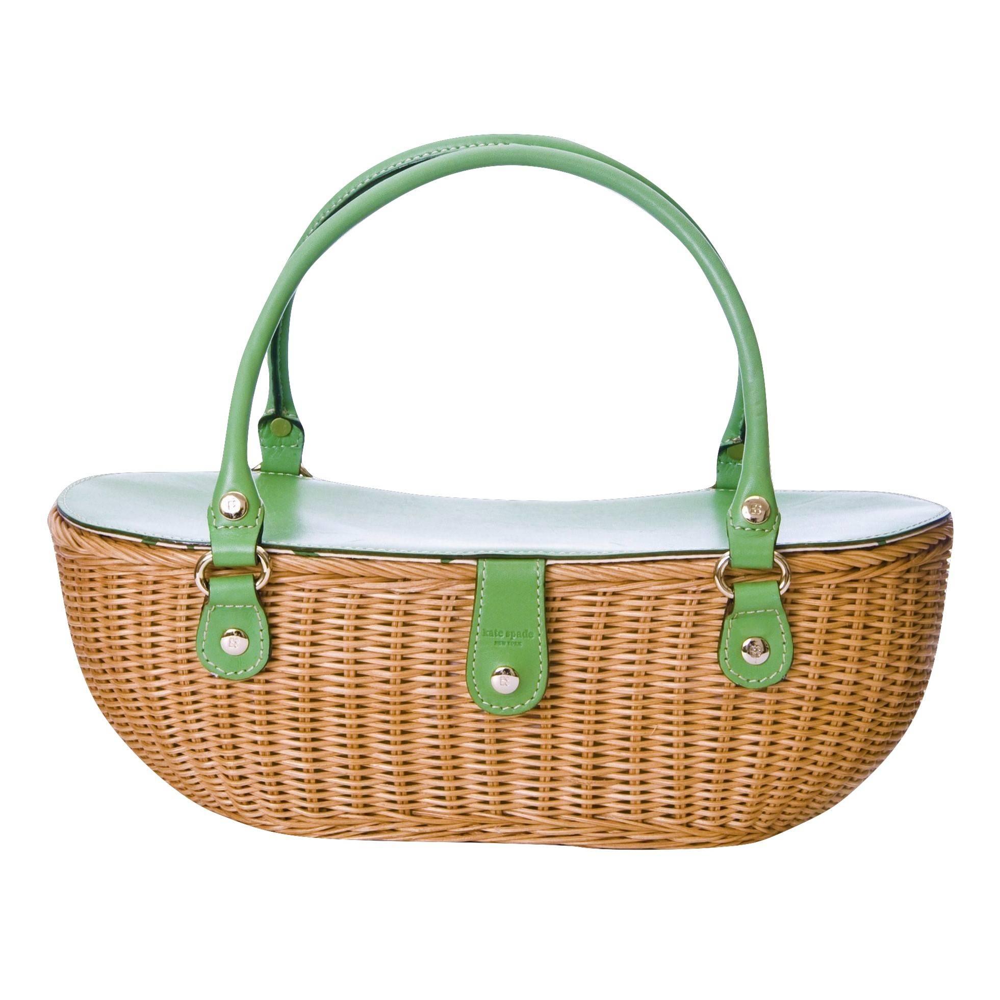 Kate Spade Wicker Bag
Rare From Her Spring 2005 Collection
Impossible to Find Brand New
* Beautiful Lacquered Woven Wicker
* Gold Hardware
* One Interior Zippered Pocket
* Stunning Coral Print Lining
* Green Leather Straps & Lid
* Small: 10